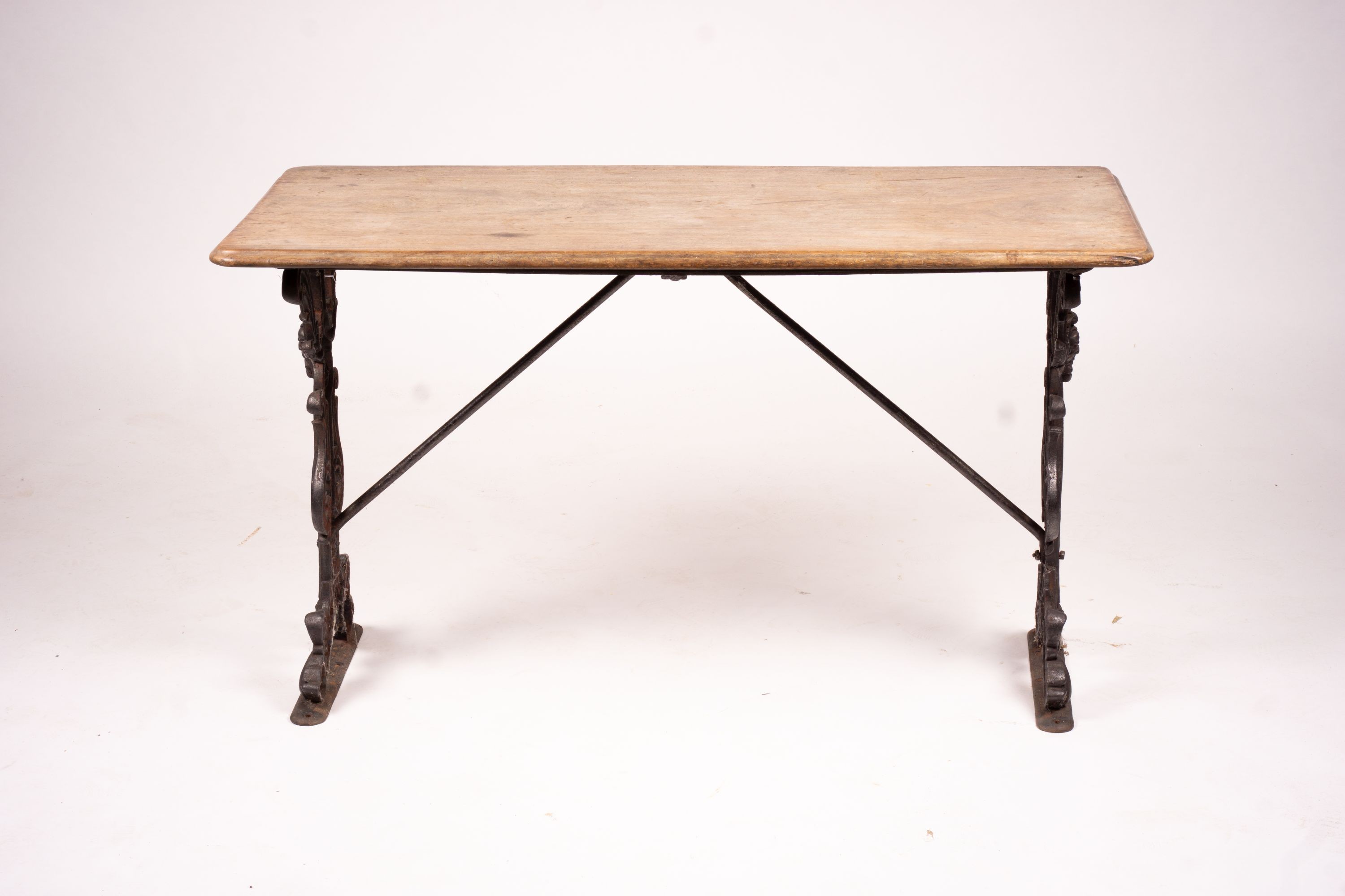 A Victorian style rectangular mahogany and cast iron tavern table, width 120cm, depth 52cm, height 69cm